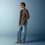 This mid brown checked blazer is cut to a relaxed fit — roomy through the chest and waist with a soft, natural shoulder — and features a notch lapel, patch pockets, and half-canvas construction.